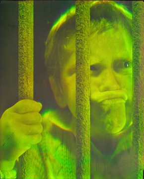 Boy Behind Bars